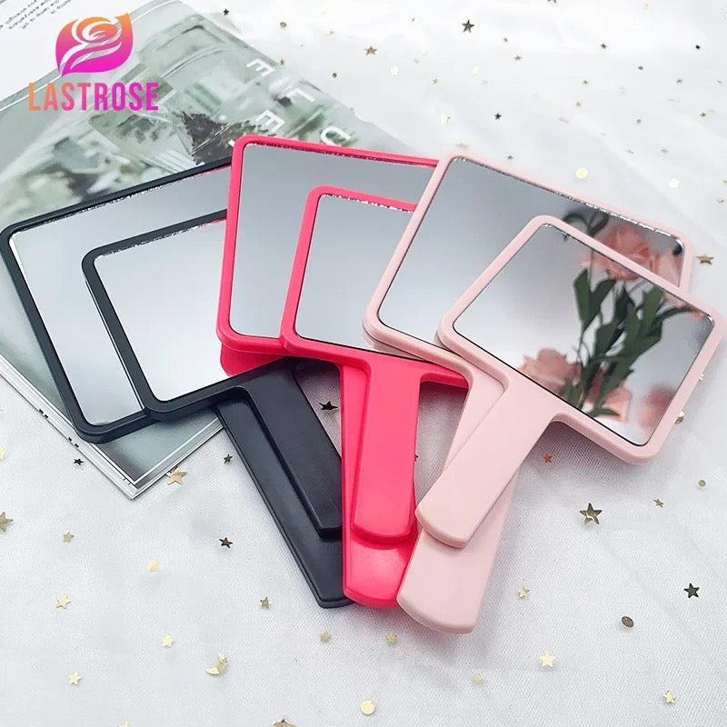 Hand held square mirror