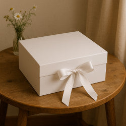 White magnetic gift box with ribbon